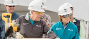 President Jimmy and Rosalyn Carter build a Habitat for Humanity home.